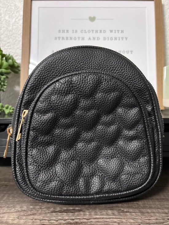 Under One Sky Handbags - Quilted Heart Mini Backpack
Convertible Crossbody &
Shoulder Bag